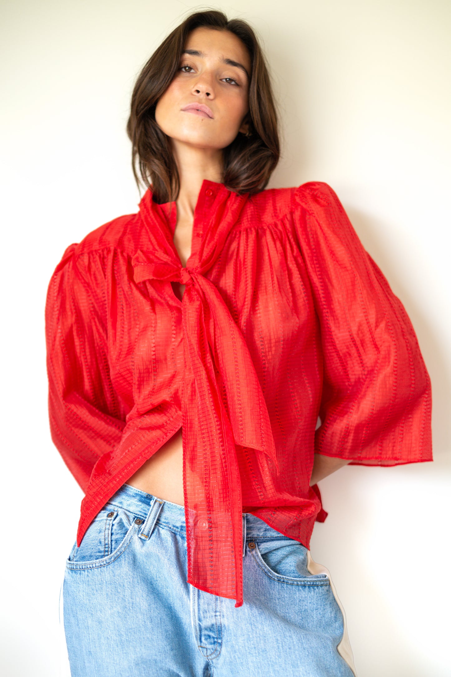 Stella Nova-Pointelle High-Neck Bow Blouse in Flame Red