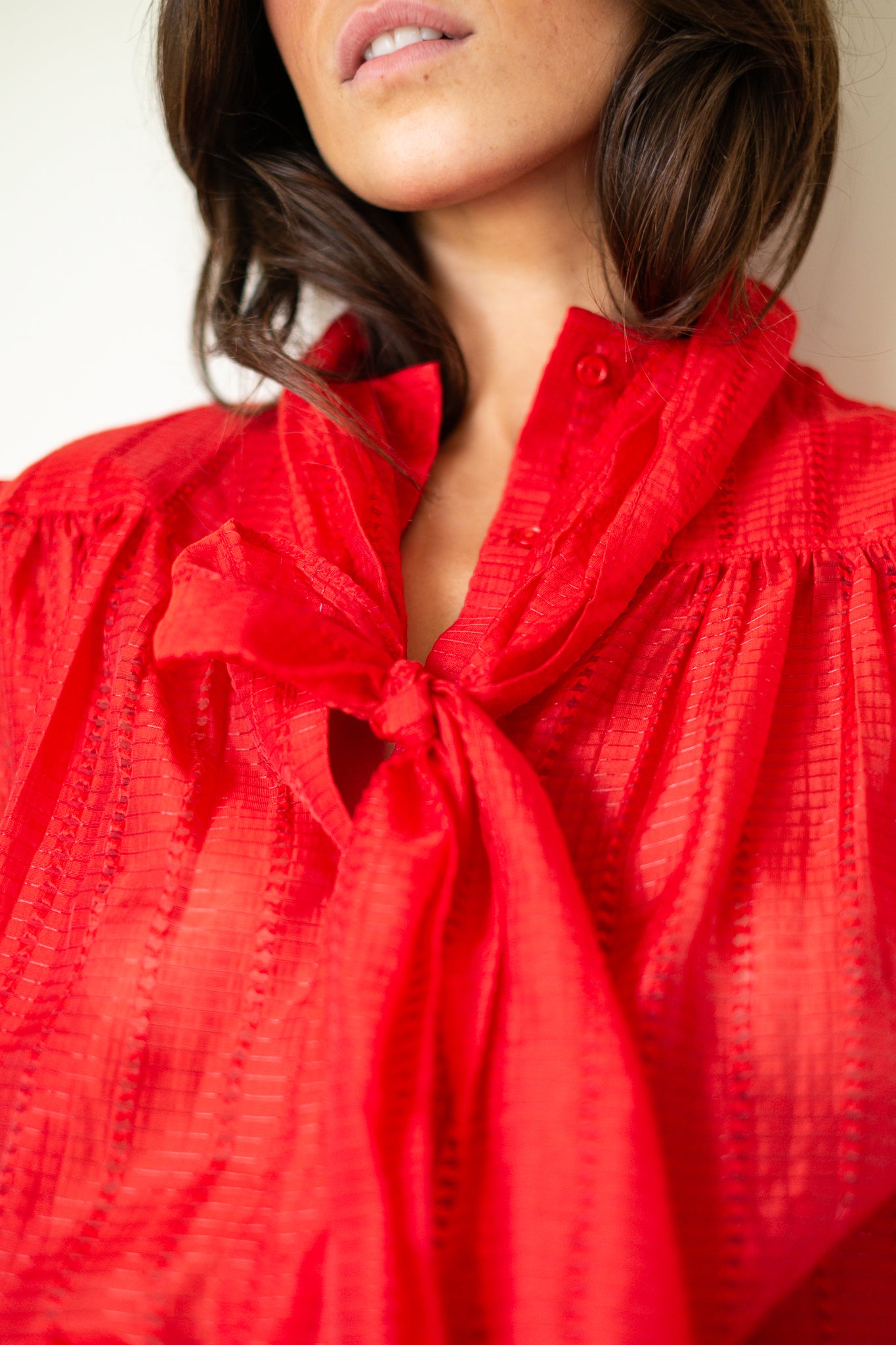 Stella Nova-Pointelle High-Neck Bow Blouse in Flame Red